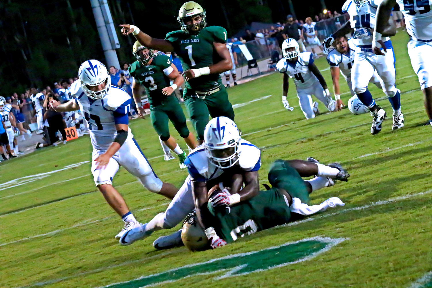 Returning senior fullback Chauncey Garrison pushed for 151 yards and this go-ahead score in the first half that tied the game at 7-7 in the first half.  Garrison suffered season-ending injury in game, but is set to run again in 2017.