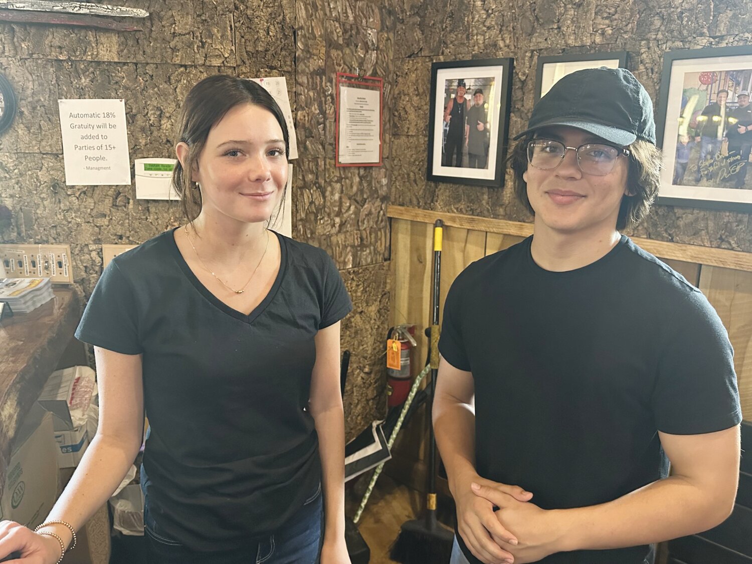 Clay High’s Bailey Allbritton and Ridgeview’s Dominick Ostrom, both 16, work as hosts at Dalton’s Sports Grill in Lake Asbury. Both are old enough to continue their schedules as long as their duties don’t hazardous responsibilities.